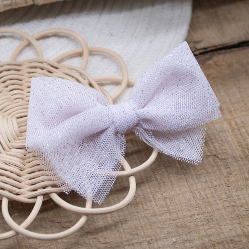 Nœud tulle rose pâle pailleté argenté
